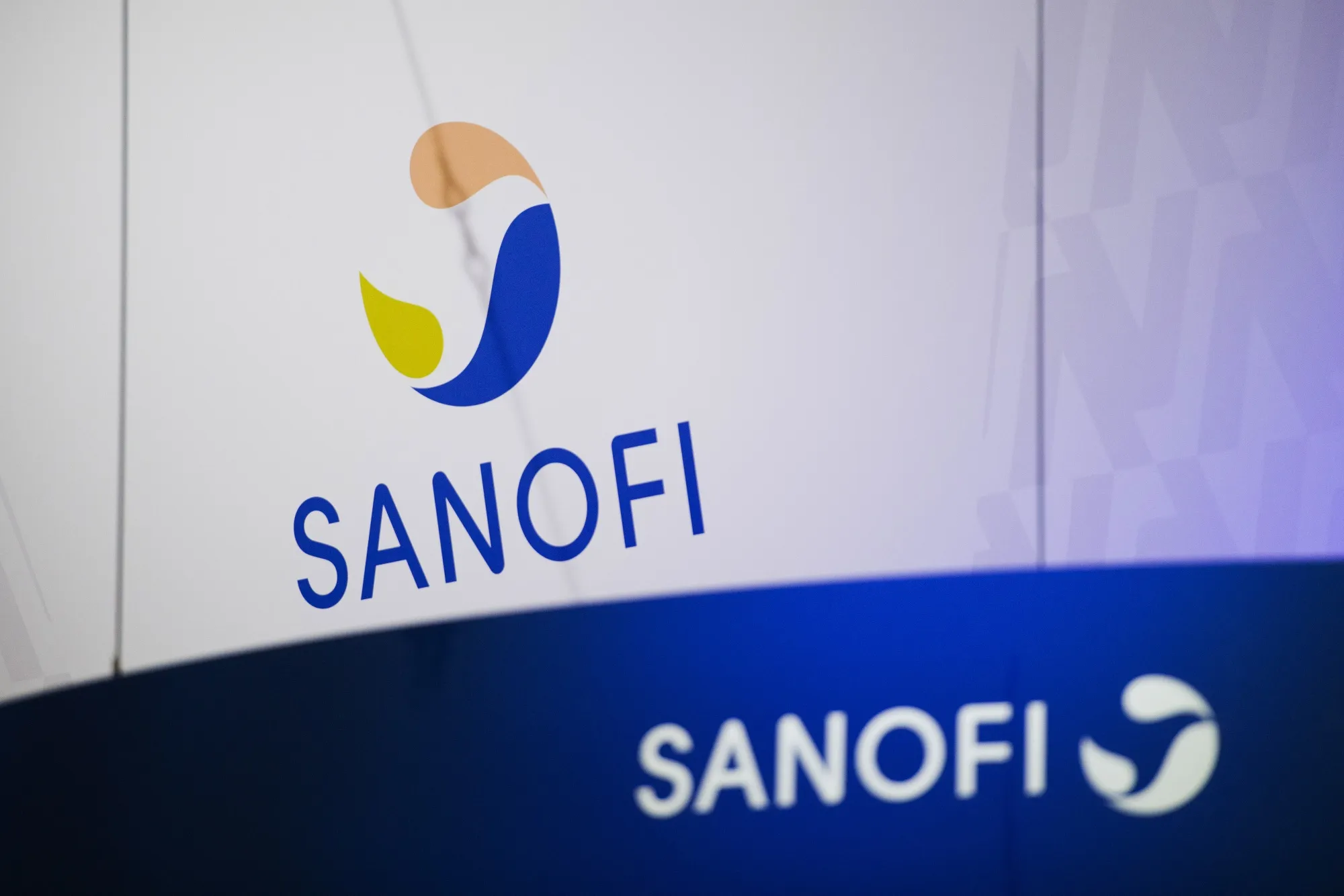 Logos on the Sanofi exhibition stand at the Viva Technology conference.