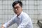 Portraits of Hong Kong National Party Founder Andy Chan, Test Case in China's Bid to Limit Speech