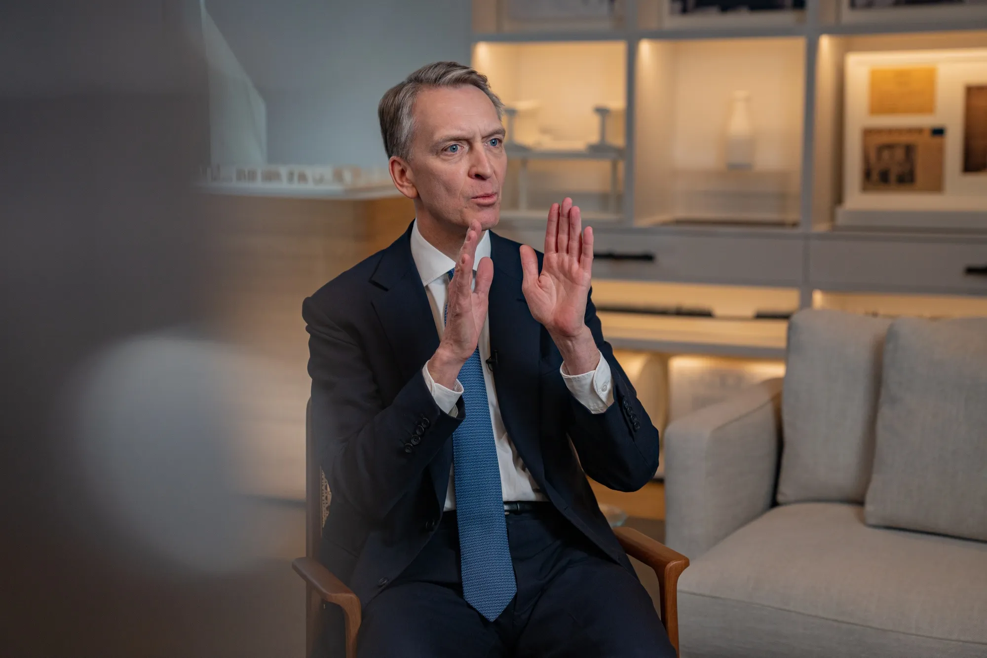 Bruce Flatt speaks with David Rubenstein during an interview at Brookfield’s Manhattan West in New York.