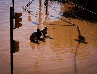 relates to Photos: Brazil Floods Kill Dozens, Leave 150,000 Homeless