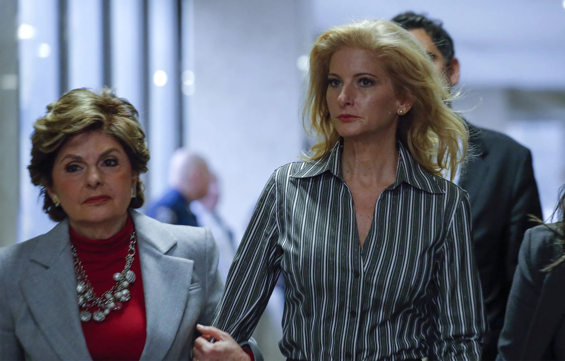 Summer Zervos, right, a former contestant on "The Apprentice" arrives with lawyer Gloria Allred at the New York County Criminal Court on Dec. 5, 2017, in New York.