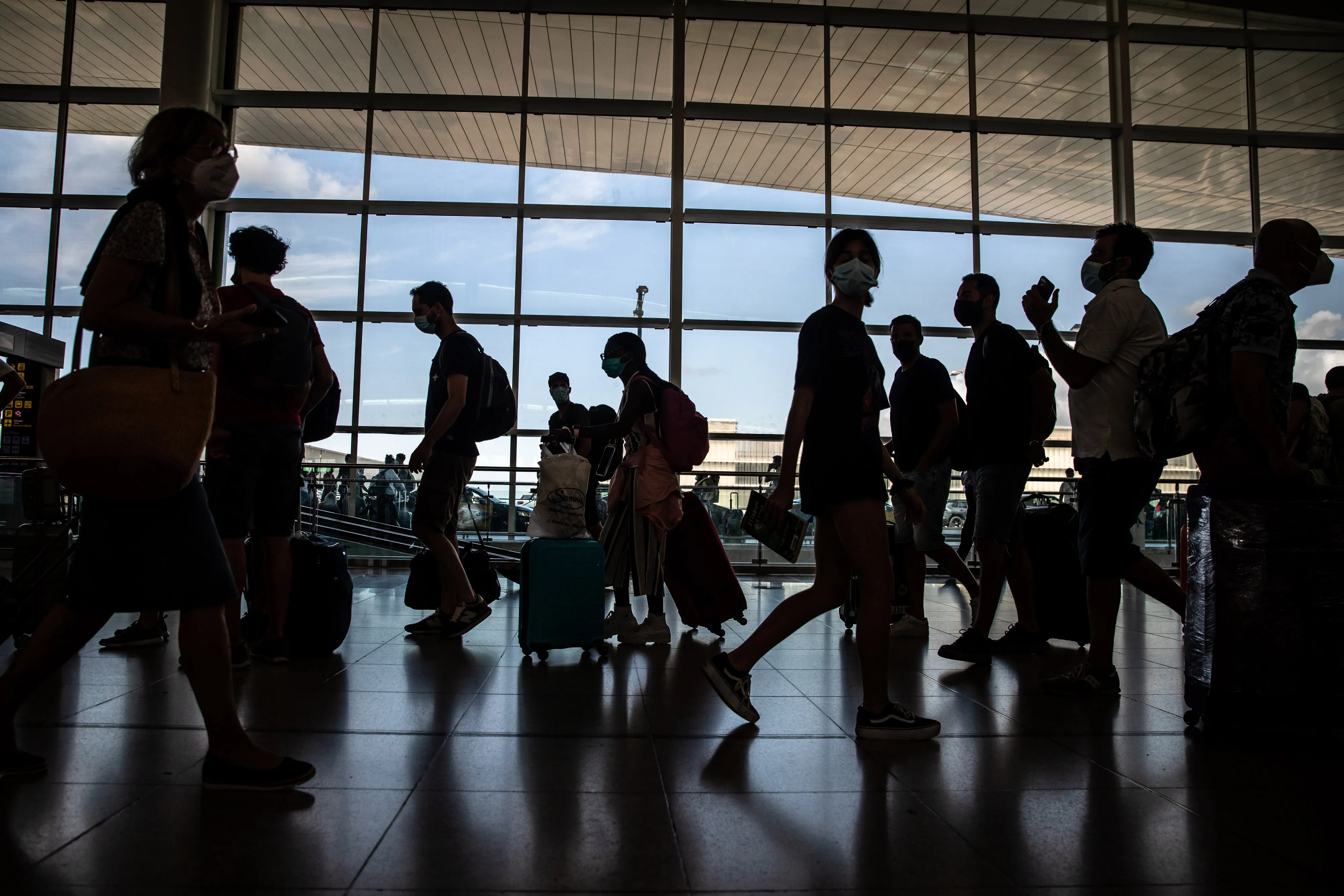Holiday Travelers at Barcelona El Prat Airport