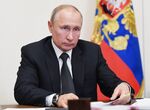 Vladimir Putin attends a teleconference meeting on May 18.
