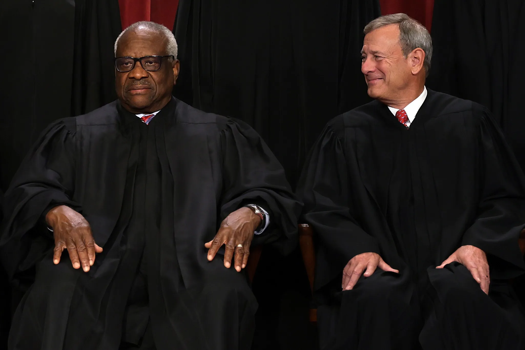Clarence Thomas and John Roberts.