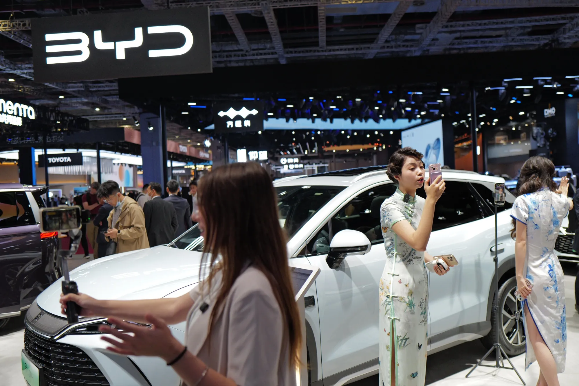 Influencers at the BYD booth at the Shanghai auto show.