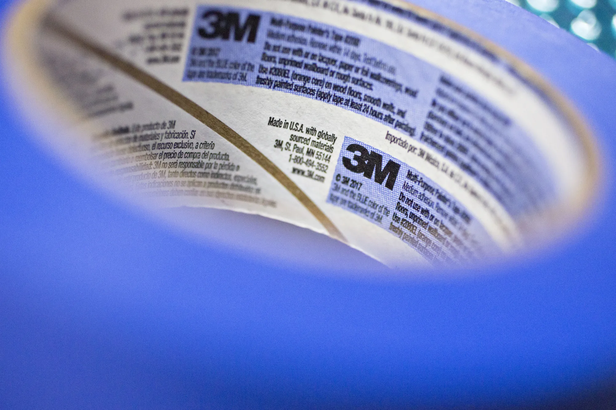 The 3M Co. logo is seen on the inside of a roll of Scotch Blue brand painters tape.