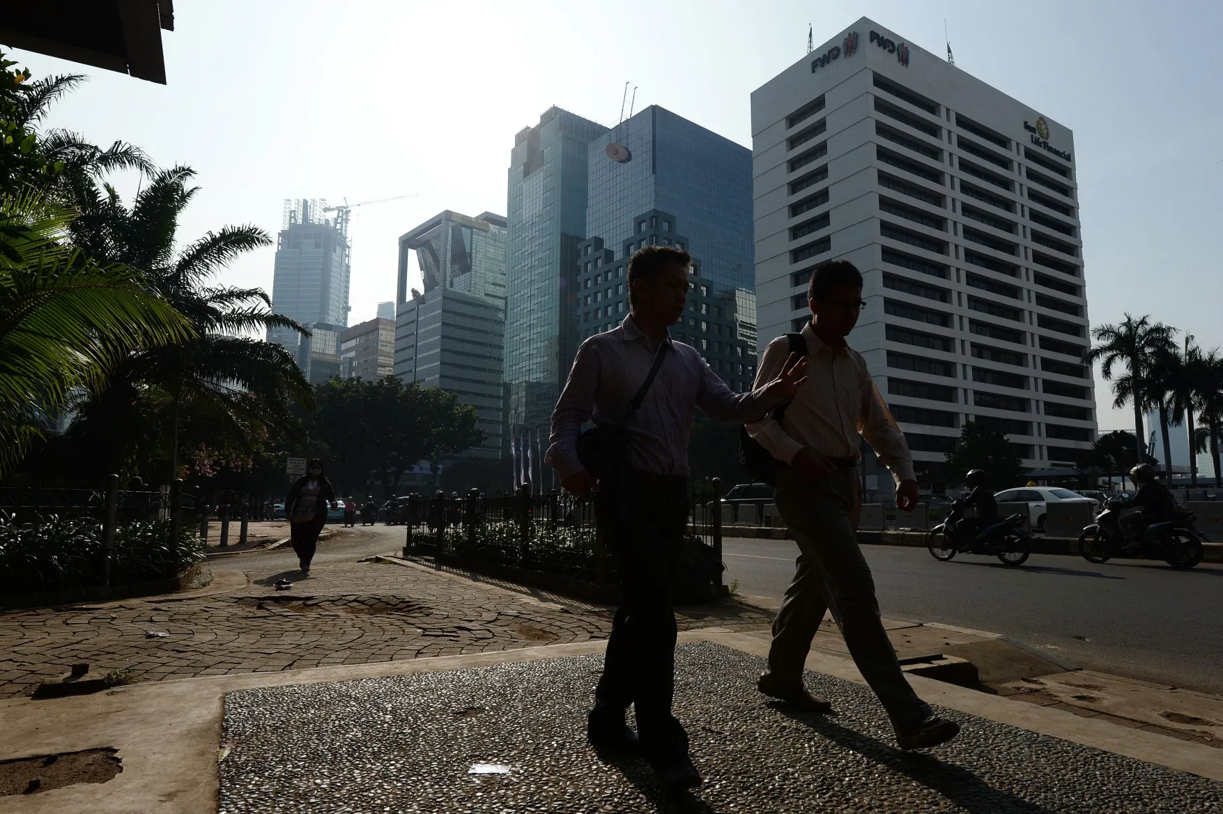Jakarta's Financial District And Commuters As Indonesia Parliament Approves Revised Budget