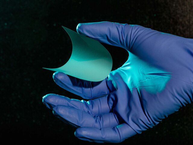 Hand holding QuantumScape’s proprietary ceramic separator that enables fast charge of lithium anodes at the Quantumscape Corporation in San Jose, CA on March 17, 2021