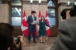 Justin Trudeau and Chrystia Freeland hold copies of the federal budget in Ottawa on Tuesday.