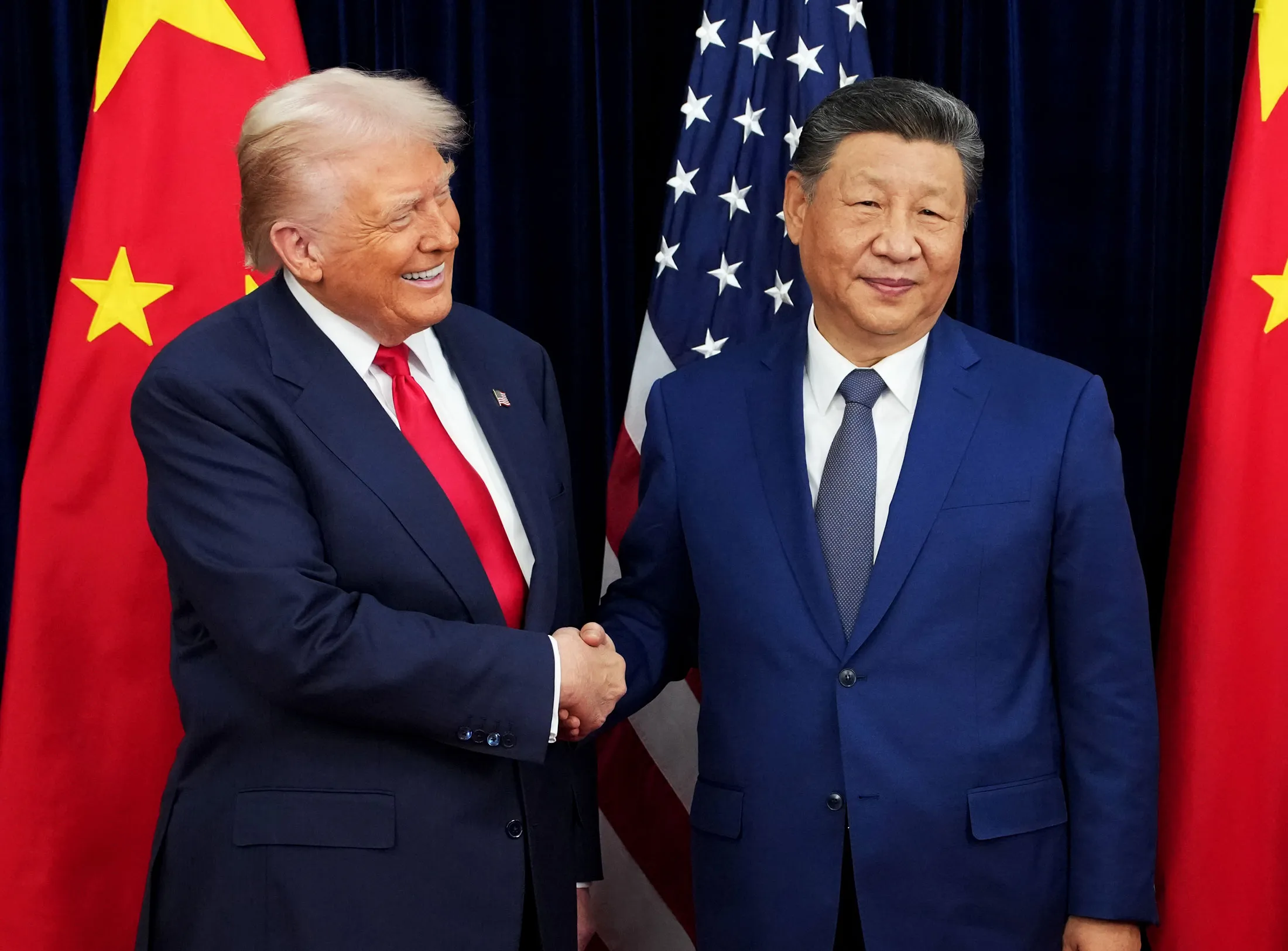 US President Donald Trump and Chinese President Xi Jinping ahead of a bilateral meeting at Gimhae Air Base on October 30, 2025 in Busan, South Korea.