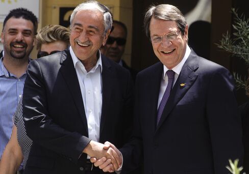 Nicos Anastasiades, right, and Mustafa Akinci.