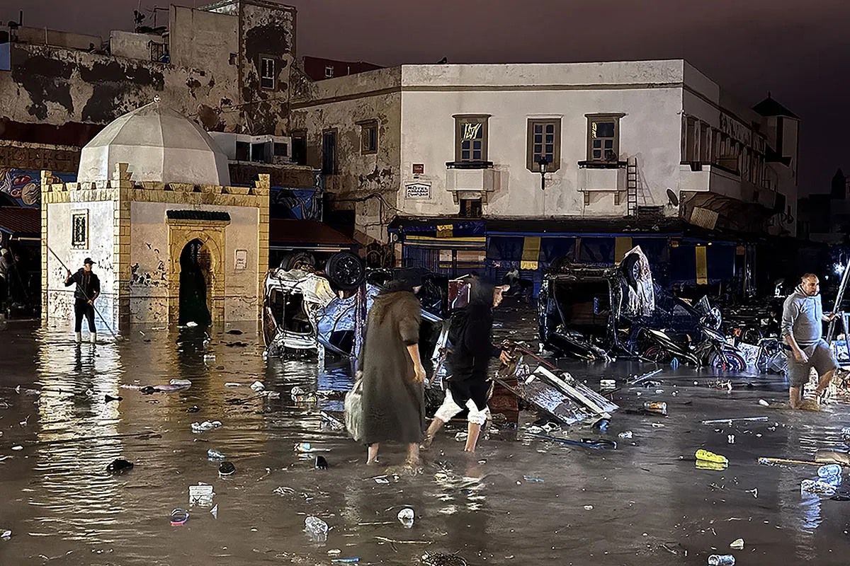 People wade through floodwaters in Safi, Morocco, on Dec. 14.