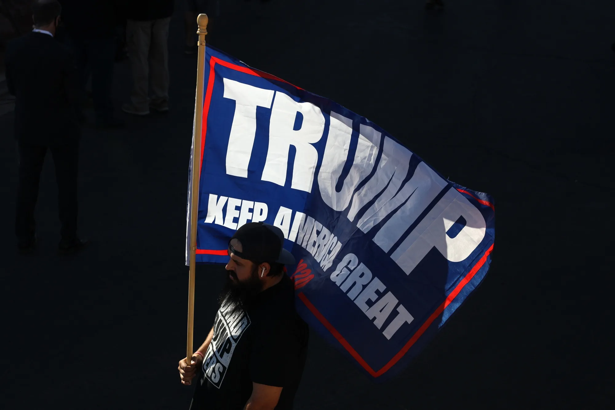 A Trump supporter demonstrates&nbsp;outside the Clark County Election Department in Las Vegas on Nov. 5.