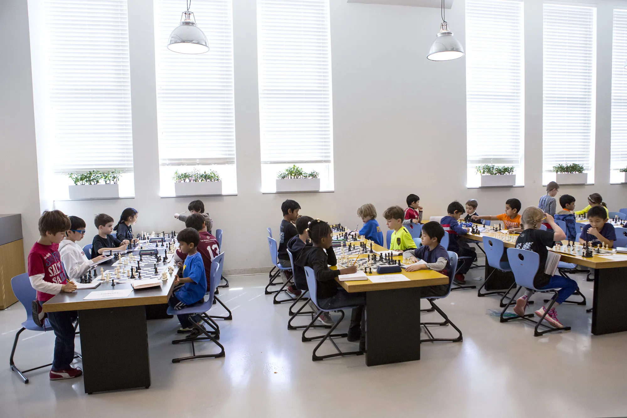 Students compete in a chess tournament at Avenues, a private school in New York.