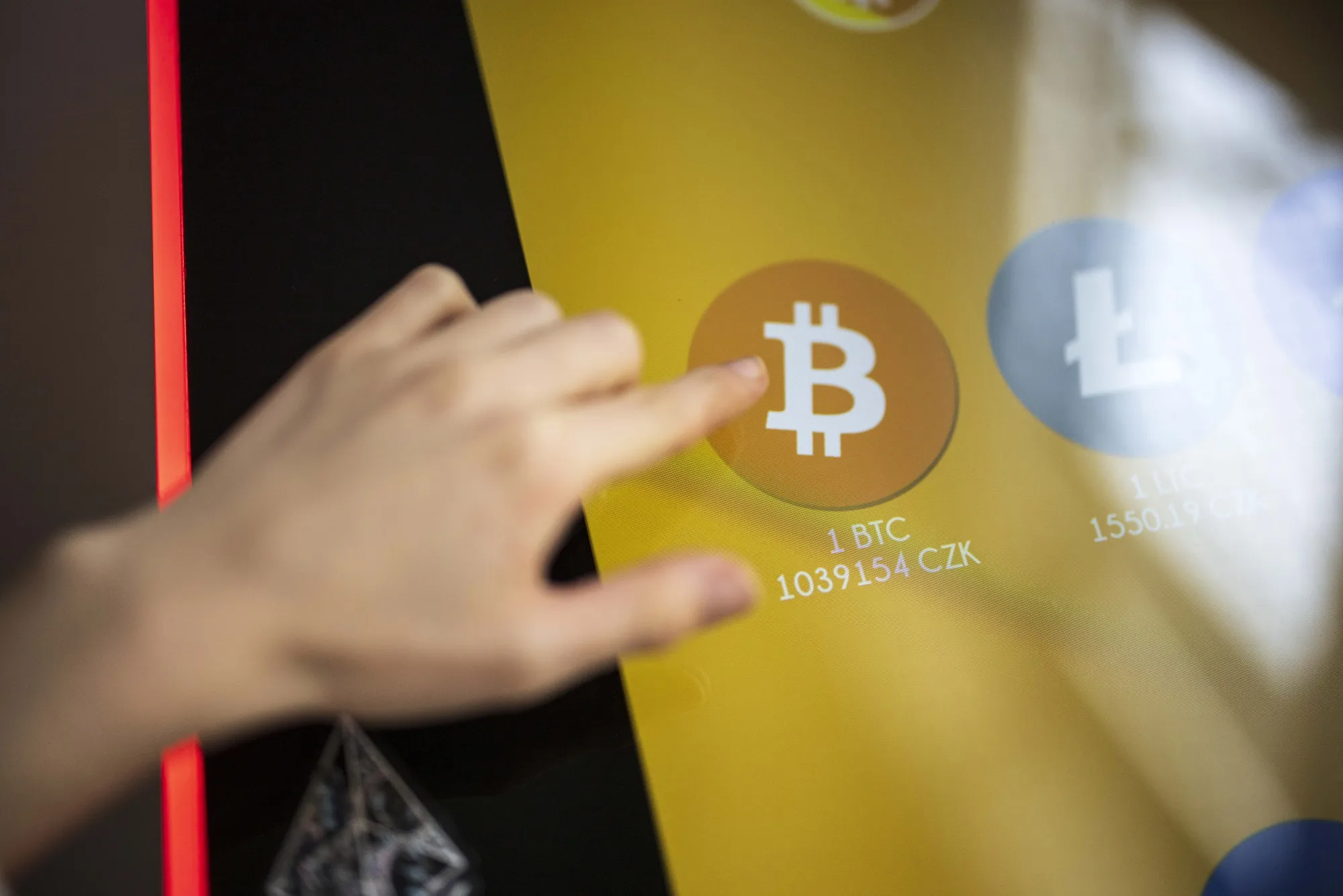 A Bitcoin logo on a cryptocurrency automated teller machine&nbsp;in Prague.