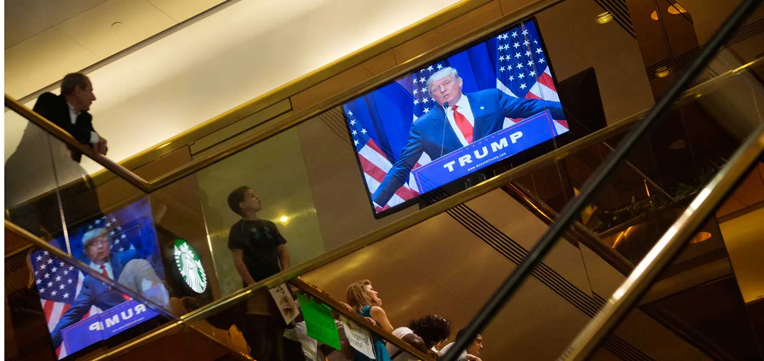 Donald Trump, president and chief executive of Trump Organization Inc., is seen on a television announcing he will seek the 2016 Republican presidential nomination at Trump Tower in New York, U.S., on Tuesday, June 16, 2015. Billionaire television personality and business executive Donald Trump formally began his Republican presidential campaign today in Manhattan, saying that the United States has become "a dumping ground for other people's problems."
