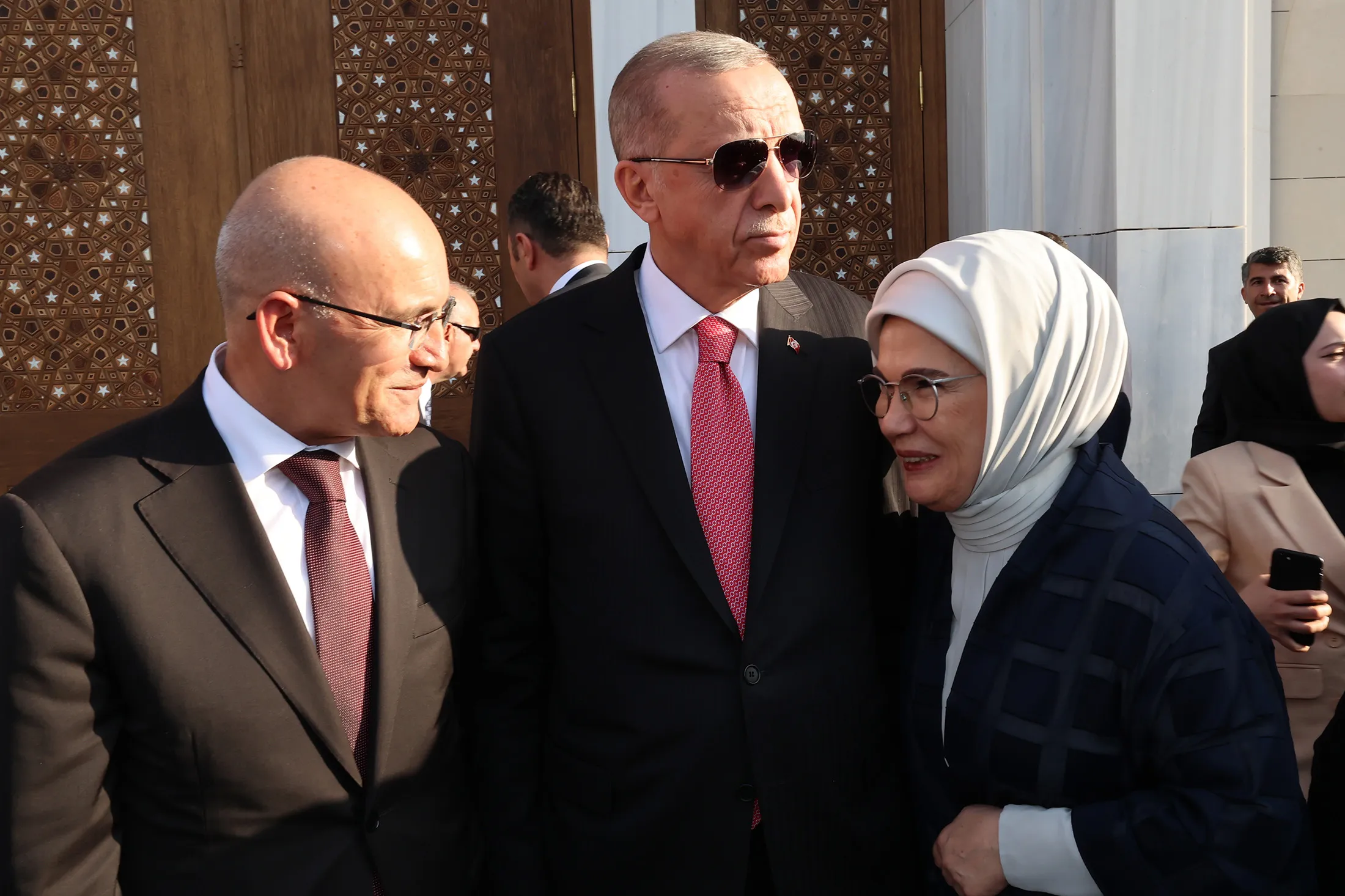 Recep Tayyip Erdogan, center, his wife Emine Erdogan, right,&nbsp;and&nbsp;Mehmet Simsek attend the opening of Necat Nasiroglu Complex in Batman, Turkey, on May 10.