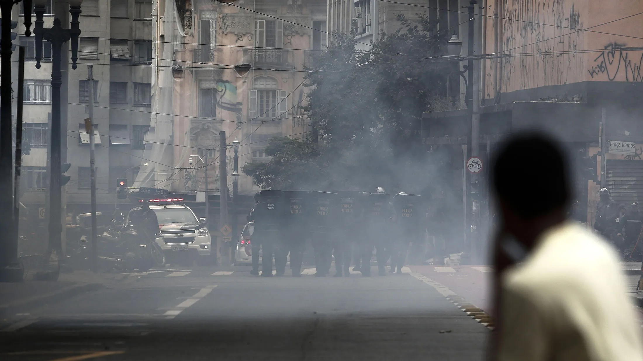 Riot police fire tear gas at demonstrators during a general strike in Sao Paulo on April 28, 2017.
