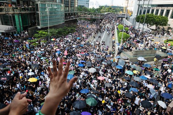 Hong Kong Police Ban Mass March After Subway Station Fire