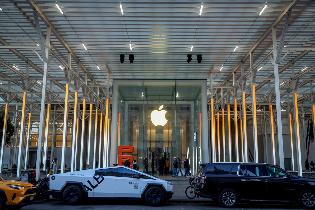 A sleek, minimalist server rack with glowing blue lights, hinting at advanced technology, set against a dark, futuristic backdrop. The design subtly reflects Apple's aesthetic while representing high-