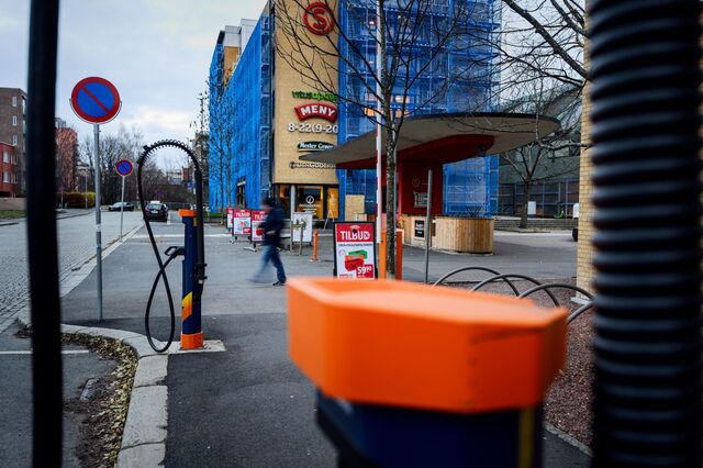 Brand new 200 KW chargers line a street in central Oslo, next to a former bus gas station.