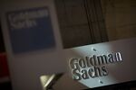 The Goldman Sachs & Co. logo is displayed at the company's booth on the floor of the New York Stock Exchange.