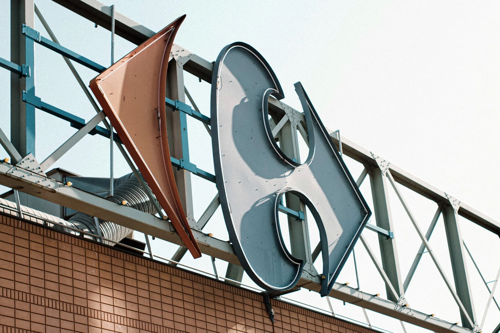 A logo above a Carrefour SA hypermarket..