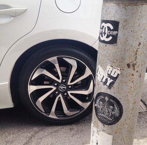 The wheels are defined by blade-like detailing.