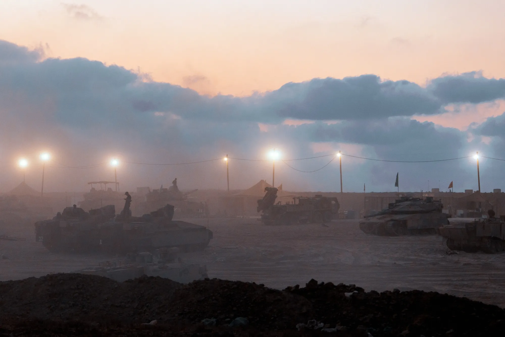 IDF soldiers prepare tanks at the Gaza border in Israel, on Aug. 22.