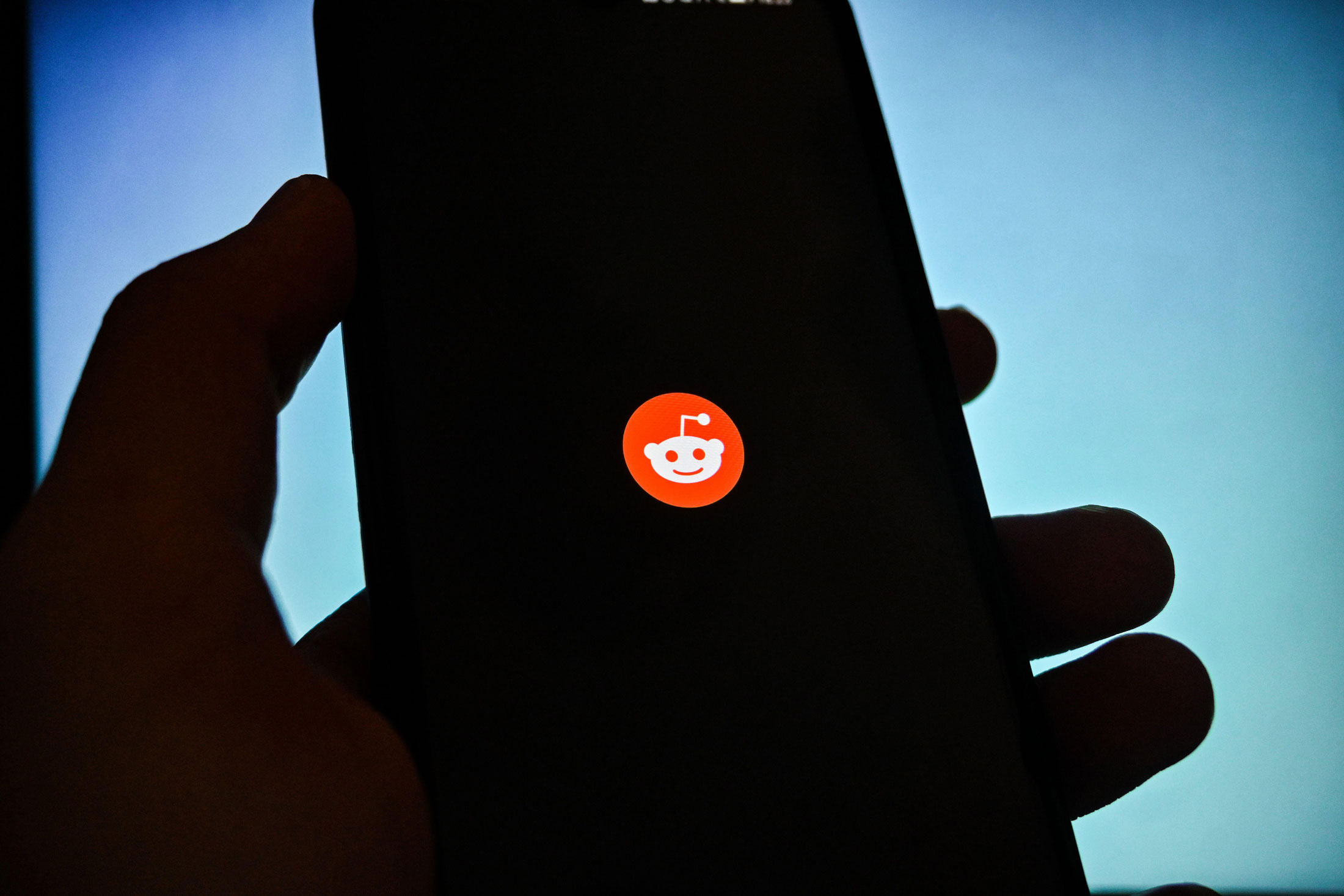 Reddit communities 'go dark' in protest of new developer fees : NPR