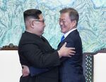 Kim Jong Un, North Korea's leader, left, and Moon Jae-in, South Korea's president