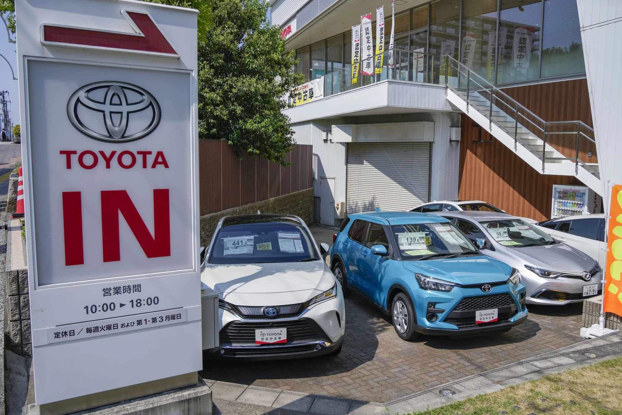 Toyota Motor used vehicles displayed for sale at a dealership in Tokyo.