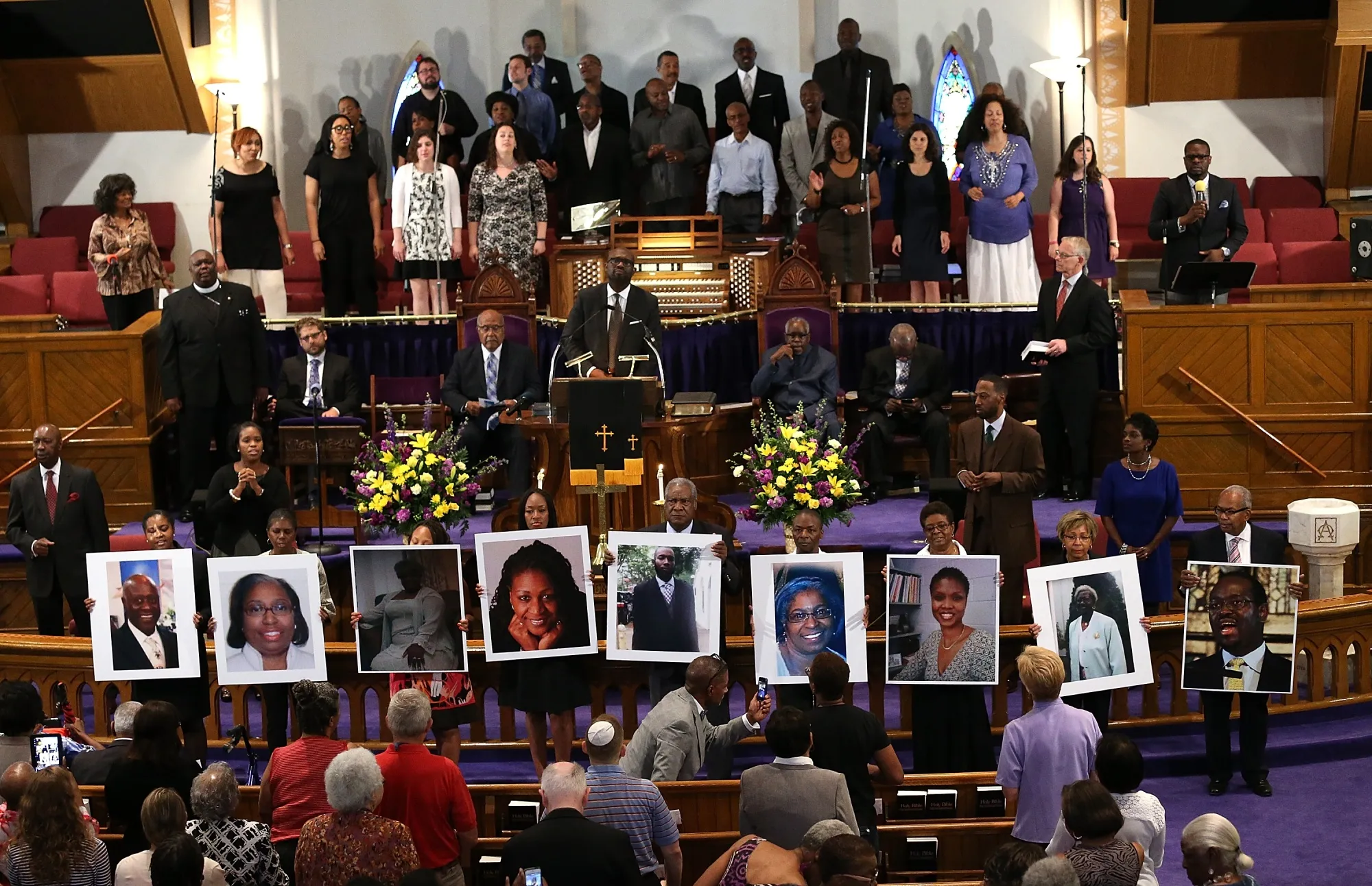 Photographs of the nine victims killed at the Emanuel African Methodist Episcopal Church in Charleston, South Carolina during a prayer vigil at the the Metropolitan AME Church&nbsp;in Washington&nbsp;in 2015.&nbsp;