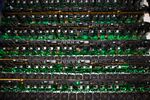 Cryptocurrency mining rigs sit on racks at a Bitfarms facility in Saint-Hyacinthe, Quebec, Canada.