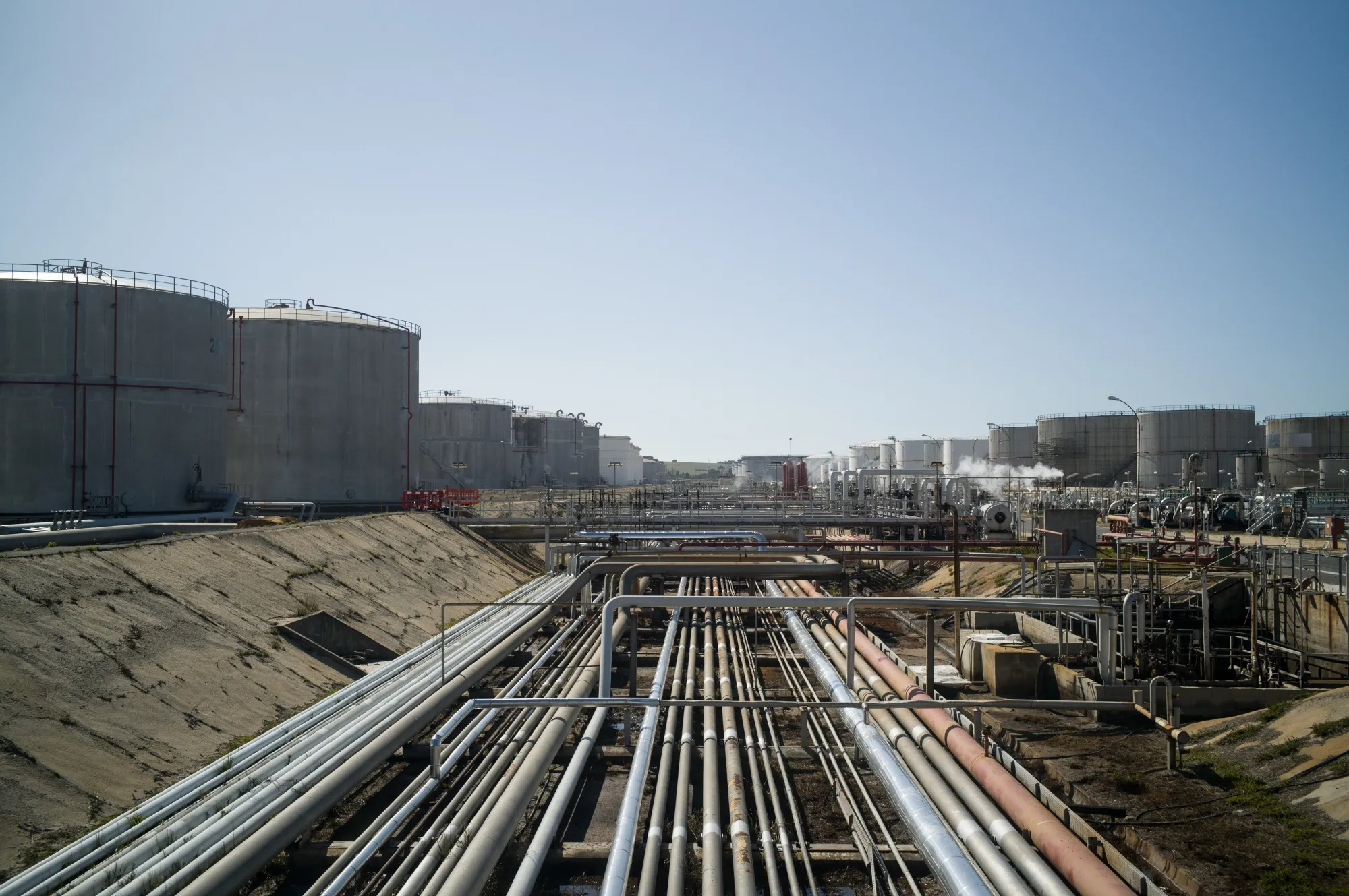 Pipes at the Galp Energia SGPS SA Sines refinery plant in Portugal.
