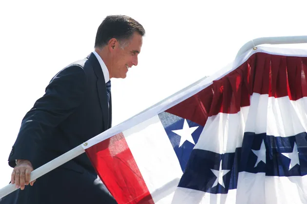 U.S. Republican presidential candidate Mitt Romney boards his plane after a campaign stop in Salt Lake City.
