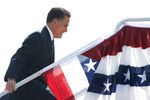 U.S. Republican presidential candidate Mitt Romney boards his plane after a campaign stop in Salt Lake City.&#13;
