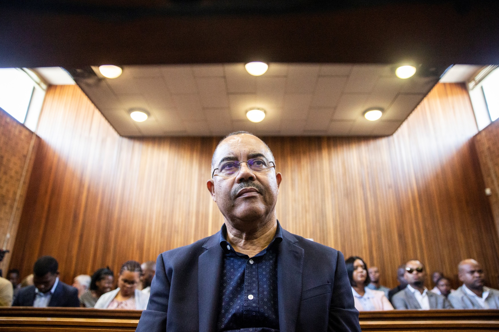 Manuel Chang, former finance minister of Mozambique, appears at the Kempton Park Magistrates court to fight extradition to the United states on January 8 2019 in Kempton Park, South Africa. - Chang has received an indictment from the US department of justice detailing charges linked to three loans to Mozambican state companies, lawyer Rudi Krause said. (Photo by Wikus DE WET / AFP) (Photo credit should read WIKUS DE WET/AFP via Getty Images) Photographer: Wikus de Wet/AFP/Getty Images