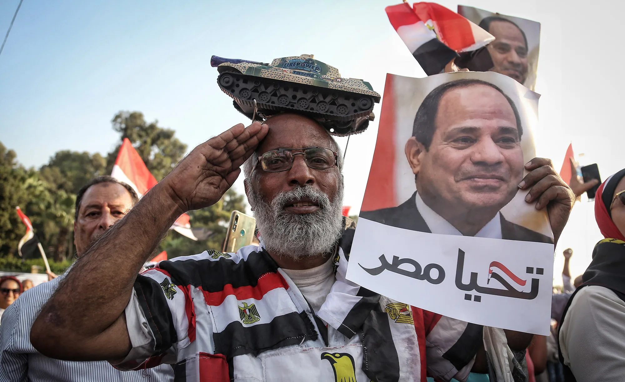A supporter of Abdel-Fattah El-Sisi salutes during a pro-government rally in Cairo on Sept. 27, 2019.&nbsp;