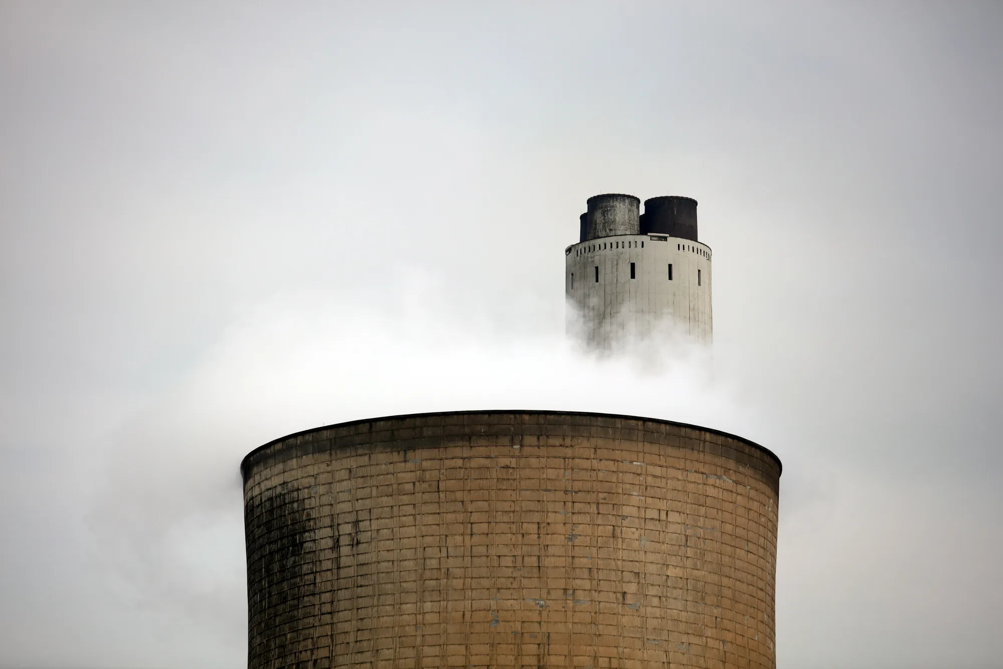 Vapour rises from a cooling tower at Uniper SE's coal-fired power station in Ratcliffe-on-Soar, U.K.