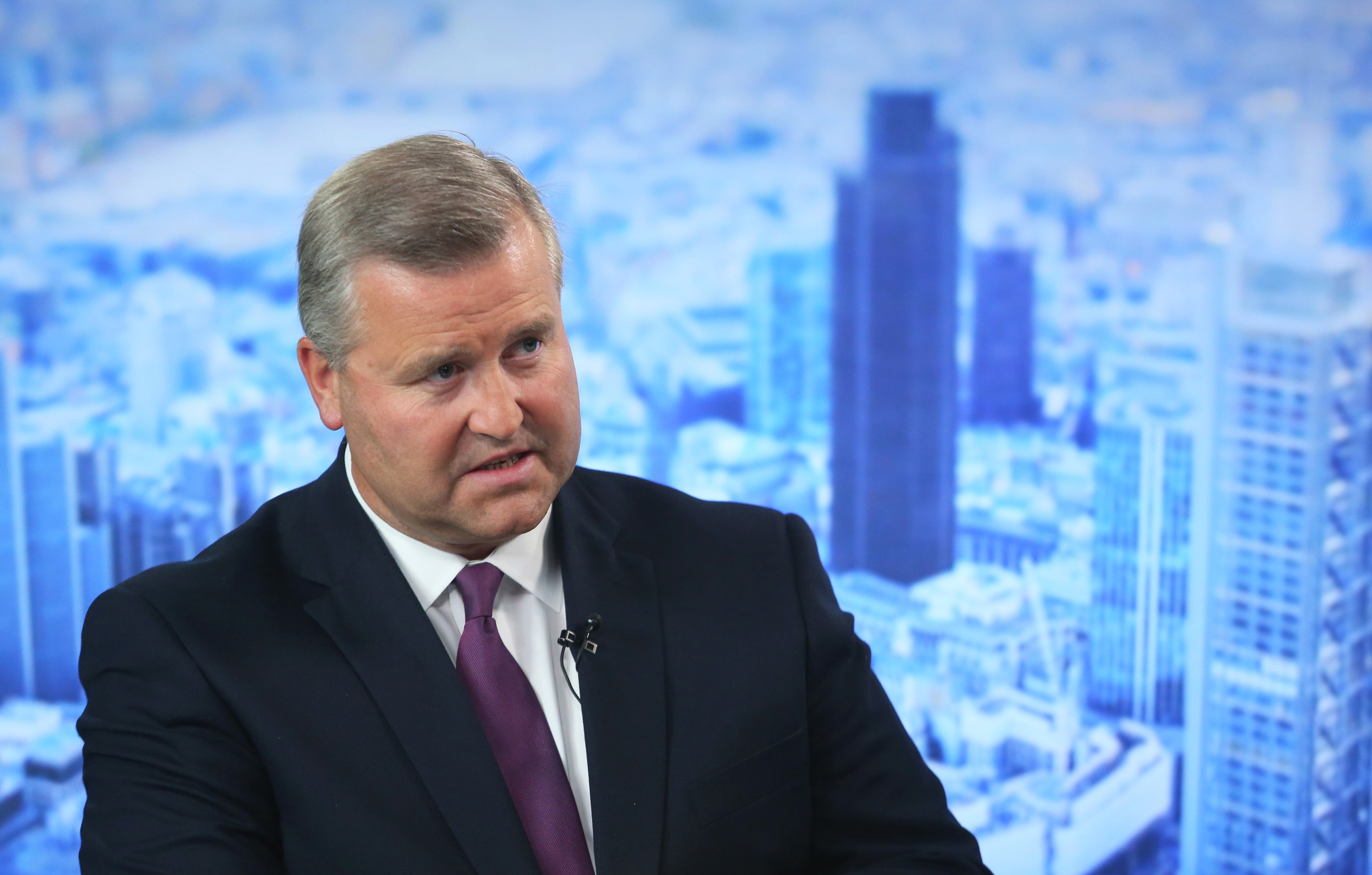 Albert Manifold, chief executive officer of CRH Plc, speaks during a Bloomberg Television interview in London, U.K., on Tuesday, Aug. 19, 2014. CRH, the biggest company on the benchmark Irish stock index, said it may spend as much as 1.5 billion euros ($2 billion) on acquisitions over the next 18 months, after the building-materials supplier reported a 27 percent increase in first-half earnings. Photographer: Chris Ratcliffe/Bloomberg *** Local Caption *** Albert Manifold