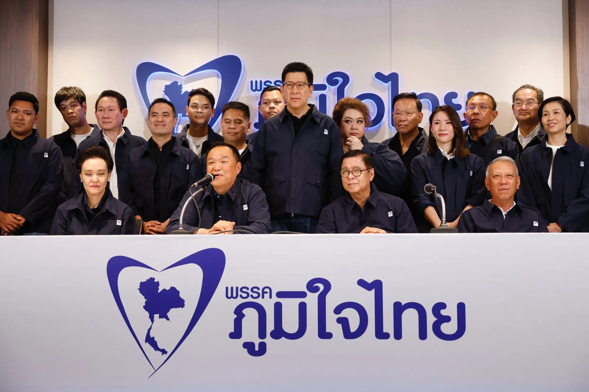 Anutin Charnvirakul, Thailand's prime minister, front row second left, speaks during a news conference at the Bhumjaithai Party headquarters on election night in Bangkok on Feb. 8.