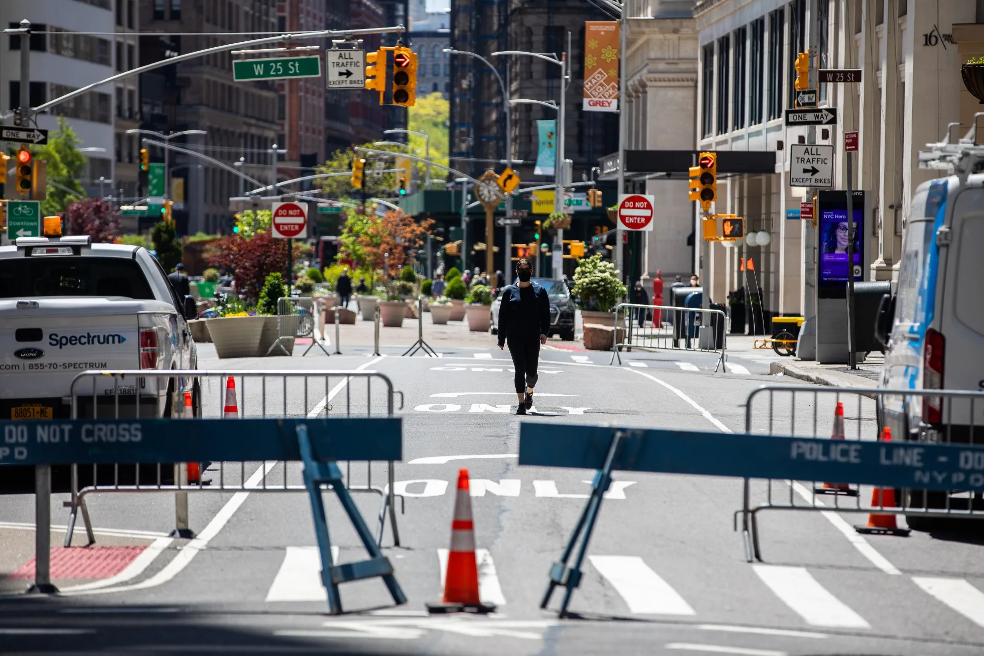A pedestrian&nbsp;walks down a street closed to vehicles in New York on May 12.
