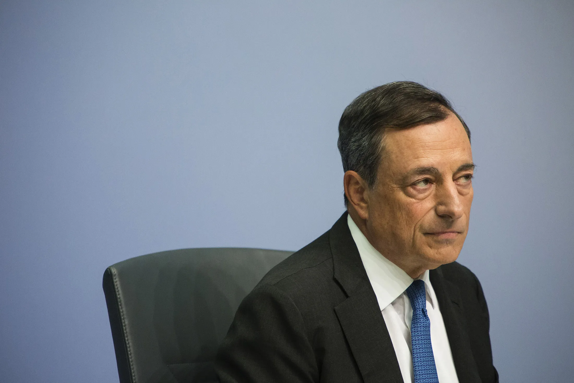 Mario Draghi, president of the European Central Bank (ECB), pauses during a news conference to announce the bank's interest rate decision at the ECB headquarters in Frankfurt, Germany, on Thursday, Sept. 3, 2015. Draghi unveiled a revamp of his quantitative-easing program that allows officials to buy higher proportions of each euro area member's debt.
