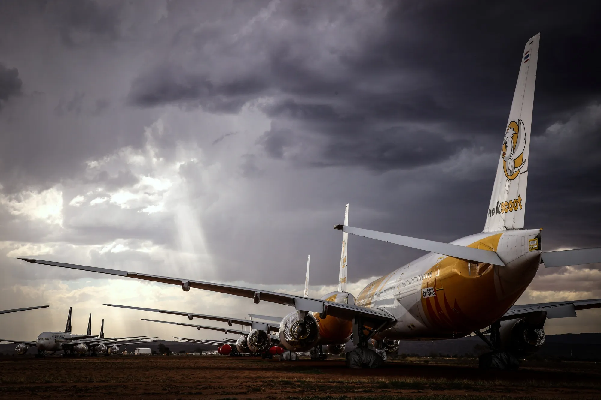 A storm approaches serviced aircraft that are sealed and stored at the Asia Pacific Aircraft Storage Facility (APAS) at Alice Springs, Northern Territory, Australia, on Oct. 21, 2020.