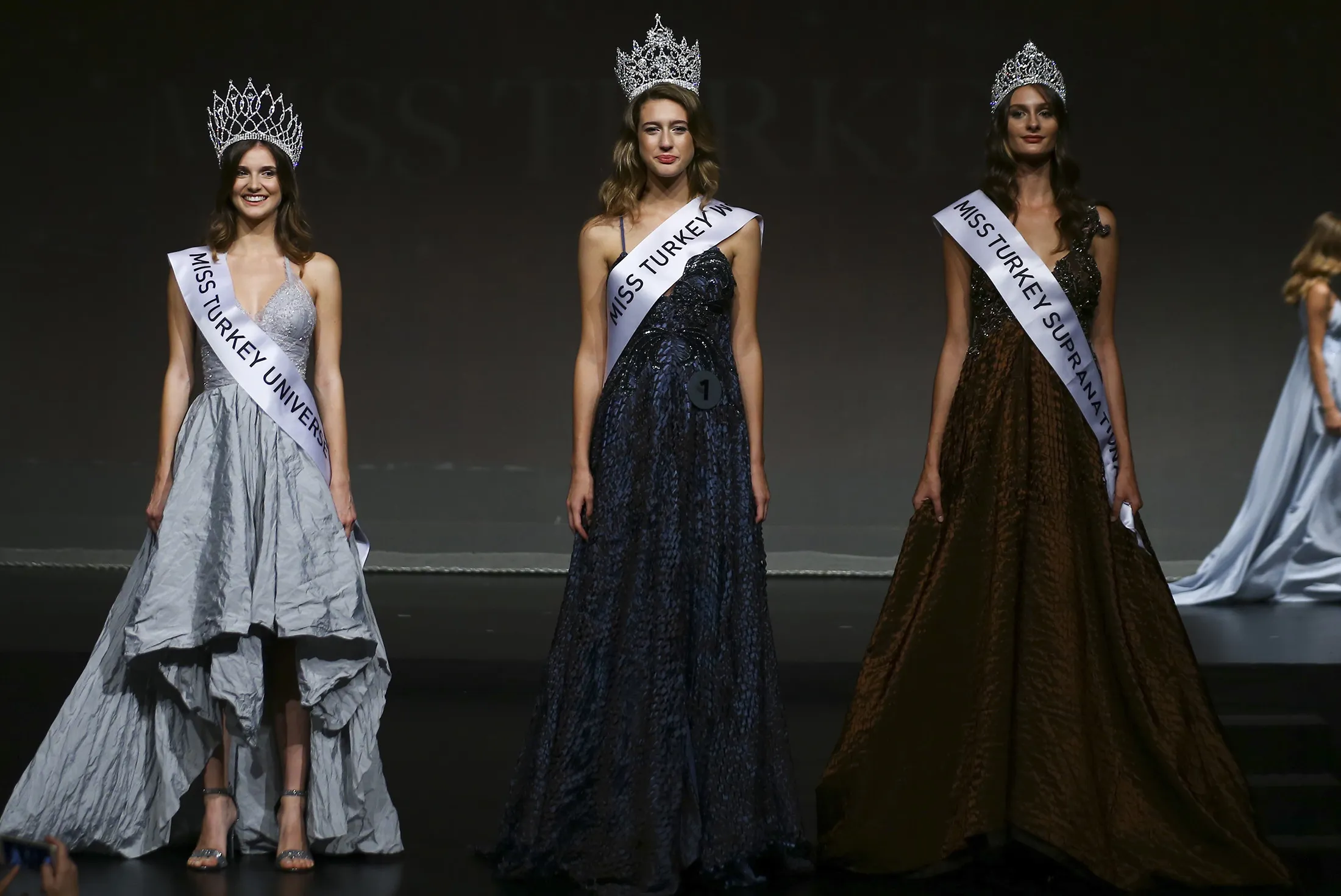 Itir Esen, center, is crowned as Miss Turkey World in Istanbul, Turkey, on Sept. 21, 2017.
