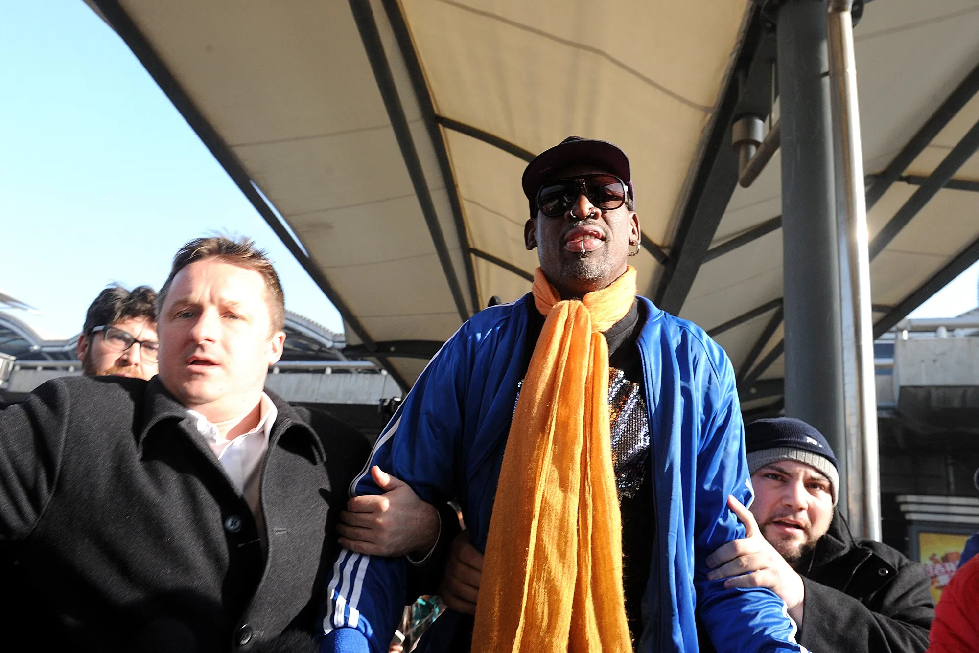 Michael Spavor, left, with Dennis Rodman in January 2014.