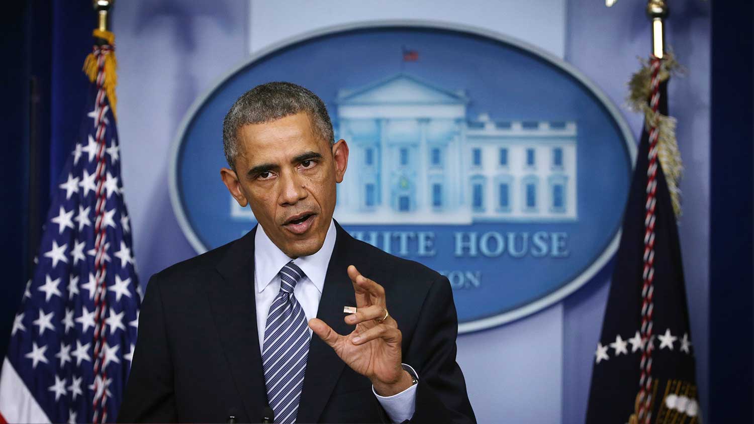 U.S. President Barack Obama makes a statement following the announcement of the grand jury's decision in the shooting death of unnamed black teenager Michael Brown in Ferguson, Missouri, at the James Brady Press Briefing Room of the White House November 24, 2014 in Washington, DC.

