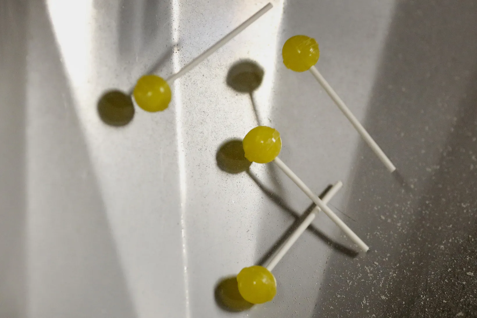 Yellow Dum Dum lollipops