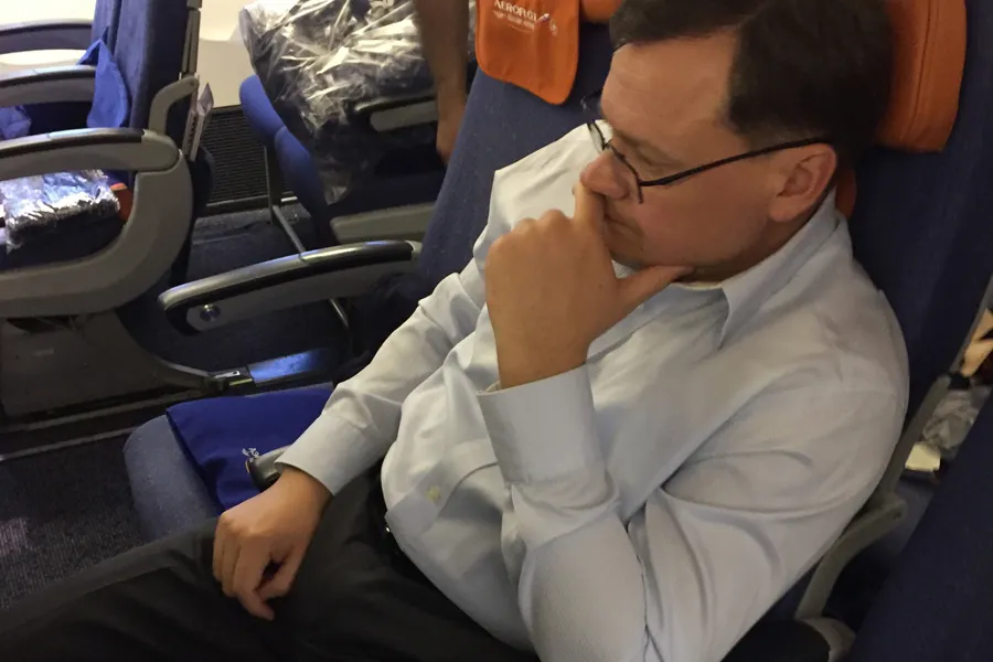 Convicted Russian spy Evgeny Buryakov, is pictured on board a commercial flight during his repatriation to Russian authorities.
